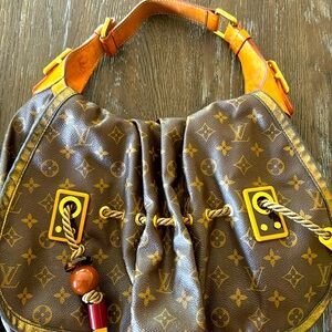 Louis Vuitton Madonna bag.